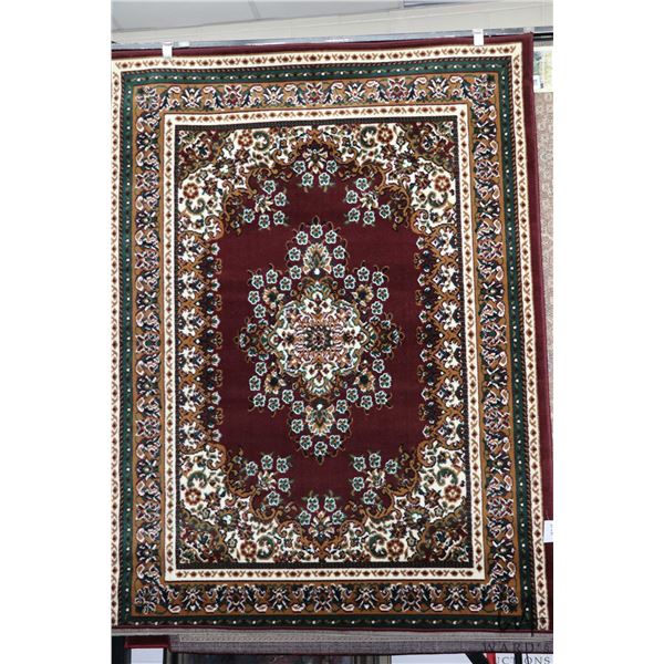 Modern polyester area carpet with deep cranberry background and highlights of black, green, cream et