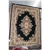 Image 1 : Modern polyester areas carpet, with center medallion, black background and highlights of black and c
