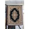 Image 1 : Modern polyester areas carpet, with center medallion, black background and highlights of black and c