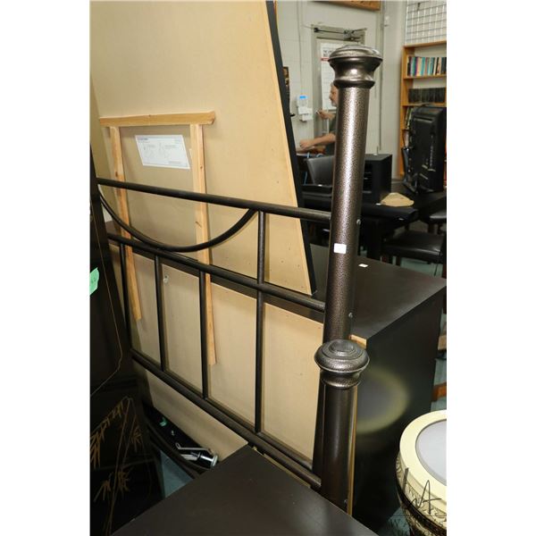 A metal four poster 60" bed with headboard, footboard and rails