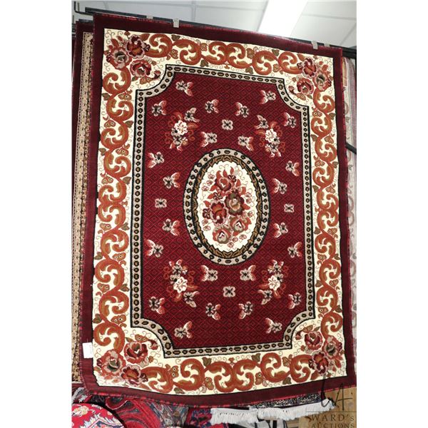 Modern polyester area carpet with center medallion Asian floral design with deep red background and 