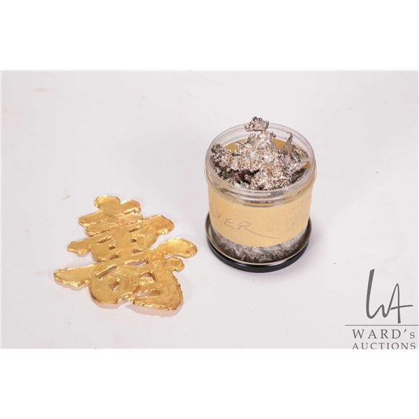 Chinese character in gold foil, tested 18kt gold 12.3 grams and a 50 gram bag of untested silver scr