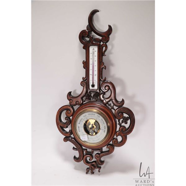 Vintage wooden scroll work thermometer and barometer