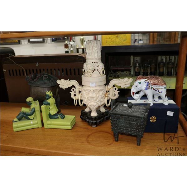Selection of modern Asian collectible including set of chalkware style bookends, resin incense burne