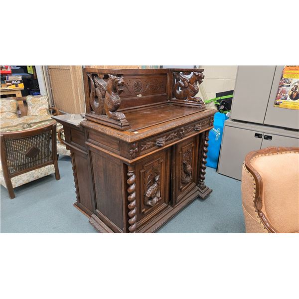 Antique chest on chest hutch with doors and two drawer base and double glazed top section. Ornately 