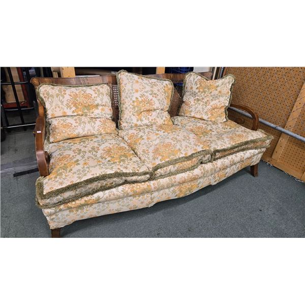 Three pieces solarium/ living room suite including 70" couch and two matching arm chairs, with uphol