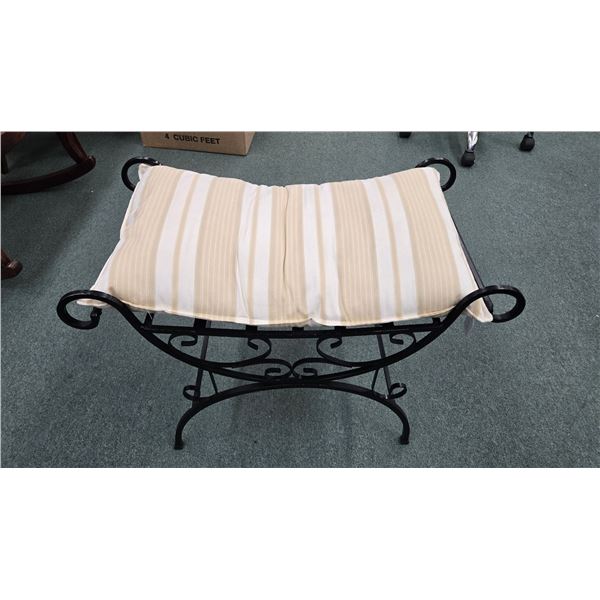 Wrought iron bench with stripped cream cushion 21" H X 26 1/2" L