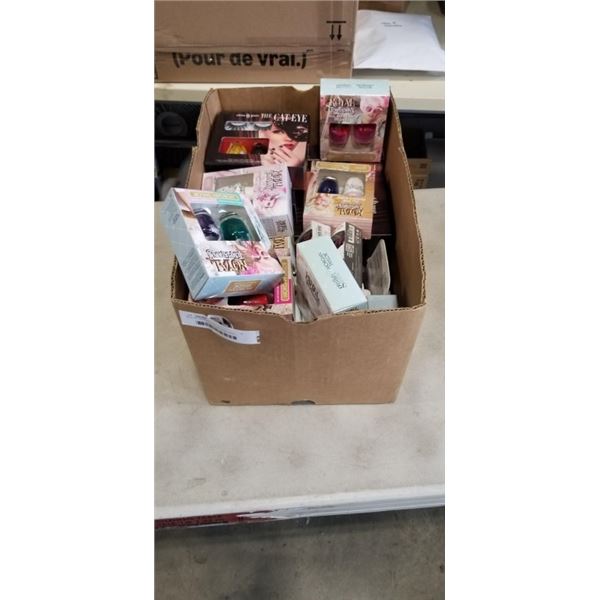 BOX OF NEW NAIL POLISH AND FAKE EYELASHES
