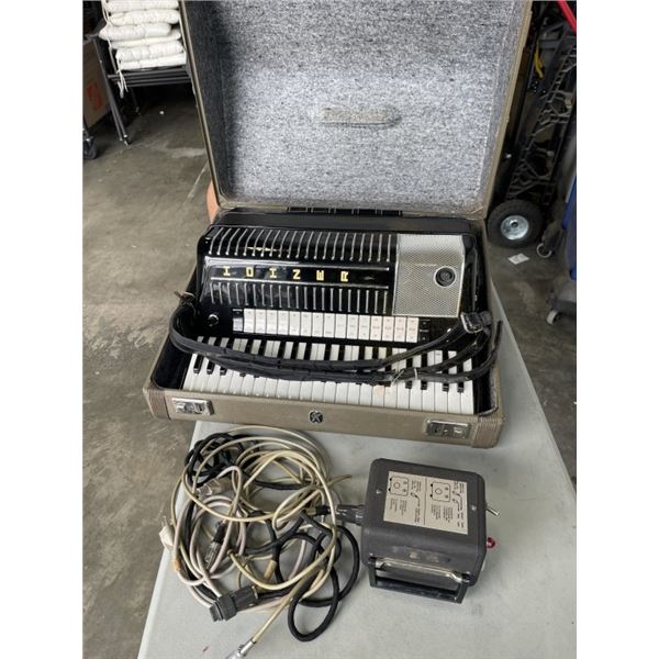 HOHNER ELECTRIC ACCORDIAN W/ POWER SUPPLY