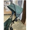 Image 4 : GREEN 4 WHEEL BABY STROLLER