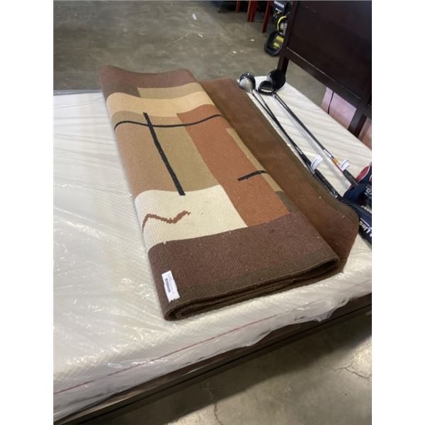 JORDANS APPROX 7X5 BROWN WOOL AREA CARPET