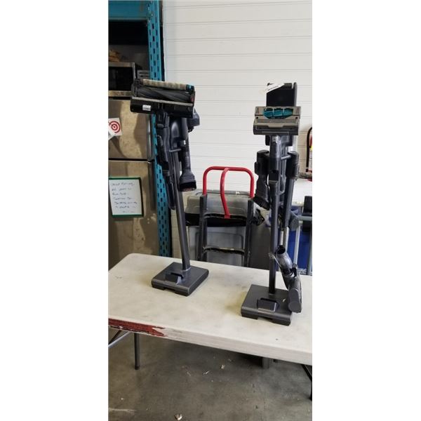 2 SAMSUNG VACUUMS BOTH NEED FILTERS AND PIPES COME WITH STAND BOTH HAVE POWER AND ARE WORKING JUST N