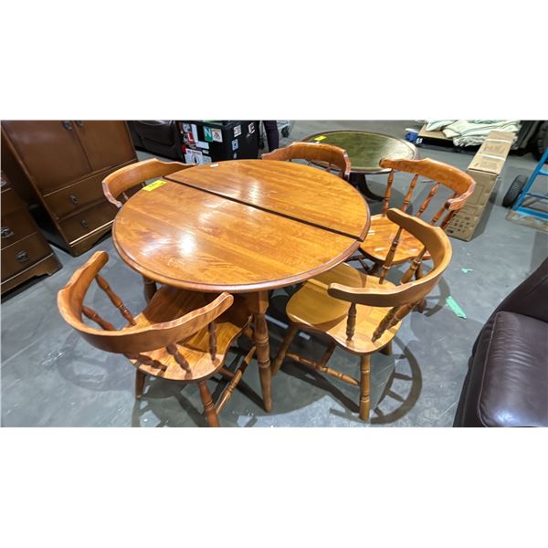 VINTAGE ROUND WOOD TABLE WITH 5 CHAIRS *APPEARS TO HAVE HAD A LEAF/LEAF IS MISSING*