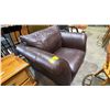Image 2 : BROWN LEATHER ARMCHAIR WITH CURVED ARMS