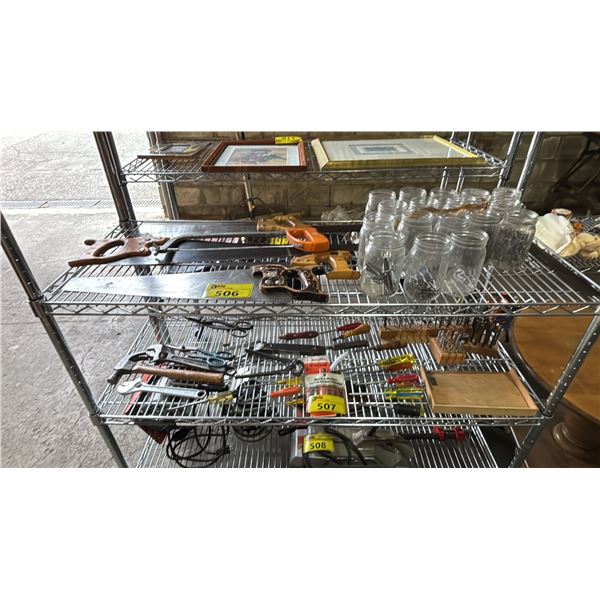 SHEL OF HAND SAWS & CANNING JARS: SOME JARS ARE FILLED WITH NAILS