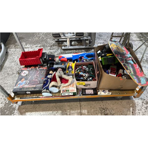 SHELF OF A LARGE ASSORTED OF TOYS: DOLLS, DUMP TRUCK, BOX OF HOT WHEELS, SKATEBOARD & MORE