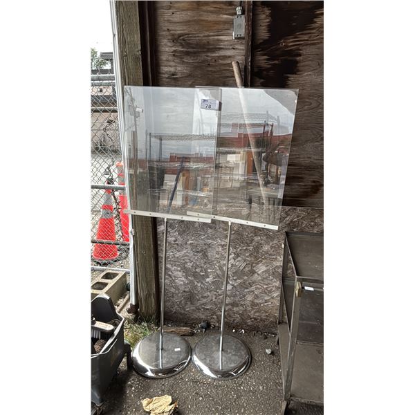 (2) ACRYLIC SIGN DISPLAYS ON METAL PEDESTAL STANDS