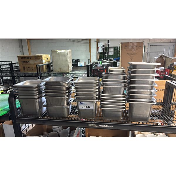 SHELF OF METAL FOOD SERVICE CONTAINERS
