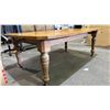 Image 3 : WOOD FARMHOUSE STYLE WIND-OUT TABLE WITH TURNED LEGS ON CASTERS