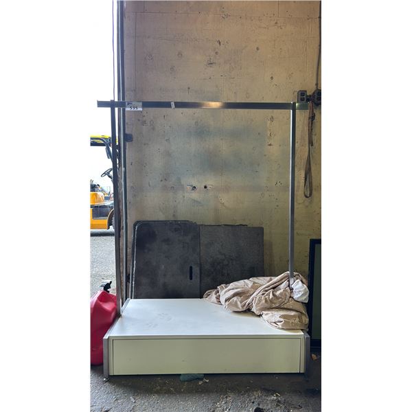 MOBILE CLOTHING RACK WITH STORAGE IN THE BASE