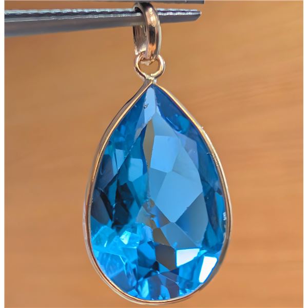 10K(1.31G), BLUE TOPAZ (6.65CT) PENDANT, SUGGESTED RETAIL VALUE $1000
