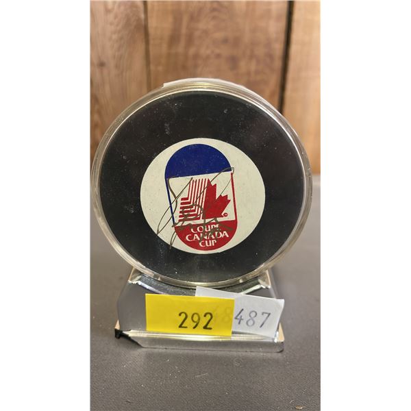 CANADA CUP HOCKEY PUCK SIGNED BY PAVEL BURE (UNKNOWN AUTHENTICITY)