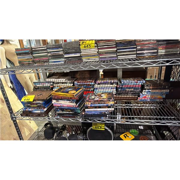 SHELF OF ASSORTED DVD'S