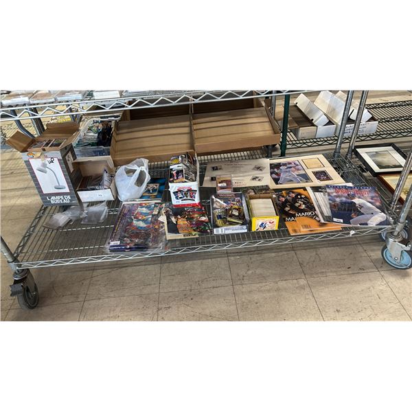 SHELF OF ASSORTED SPORTS CARDS & COLLECTIBLES
