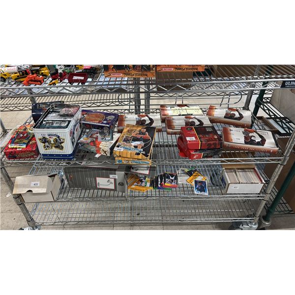 SHELF OF ASSORTED SPORTS & COLLECTIBLE CARDS
