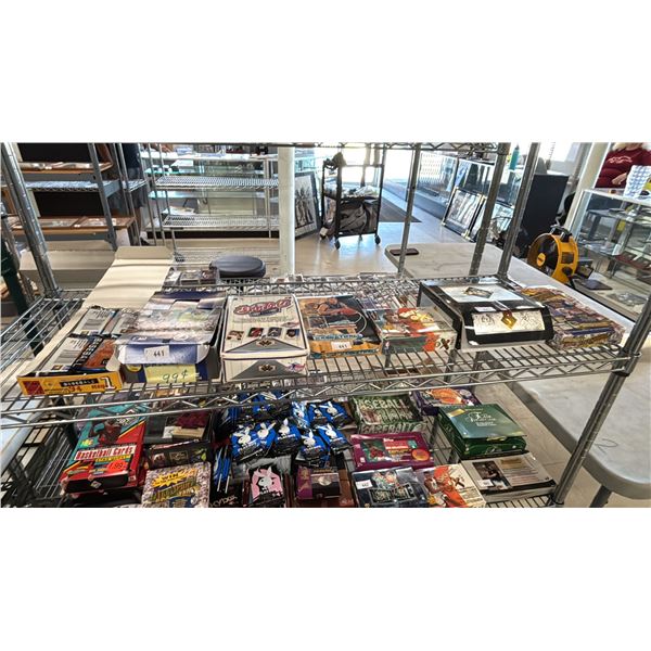 SHELF OF ASSORTED SPORTS CARDS