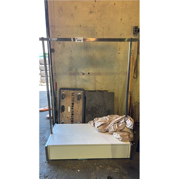 MOBILE CLOTHING RACK WITH STORAGE IN THE BASE
