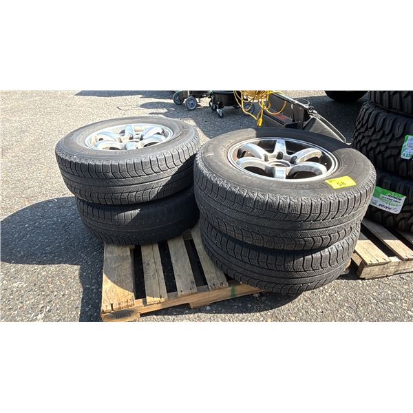 SET OF 4 MICHELIN LATITUDE X-ICE 255/70R17 112T TIRES MOUNTED ON 6 BOLT METAL RIMS