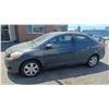Image 1 : 2007 TOYOTA YARIS, 4 DOOR SEDAN, GREY, VIN JTDBT923771044867,