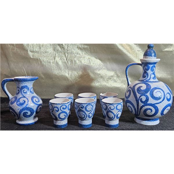 Blue and White Ceramic Pitchers and Cups with Swirl Pattern