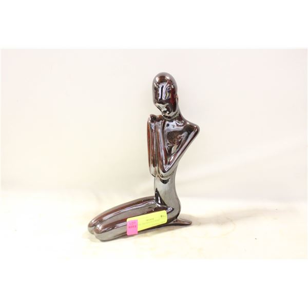 CERAMIC BROWN FIGURINE