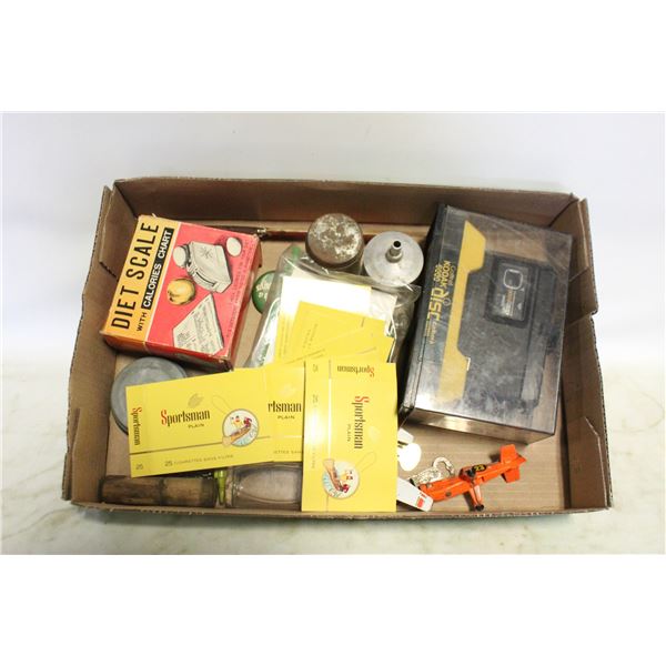 FLAT WITH KODAK CAMERA, SCALE, BOTTLES,