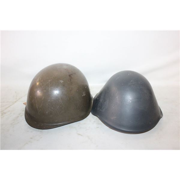 TWO METAL ARMY HELMETS