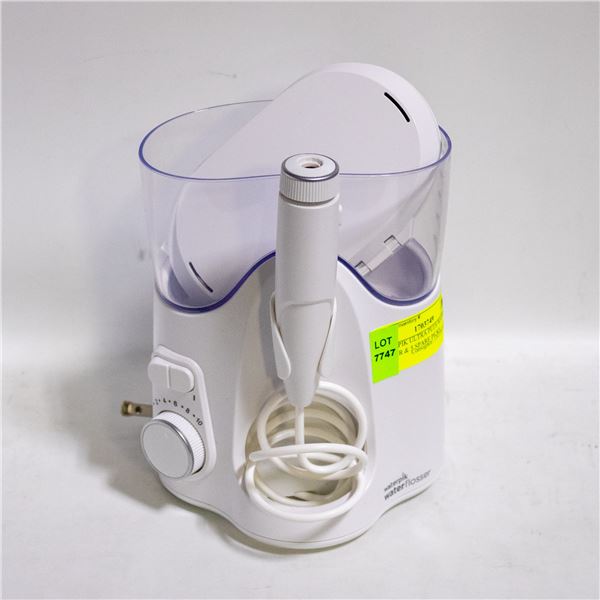 WATERPIK ULTRA PLUS WATER FLOSSER & 5 SPARE PICKS