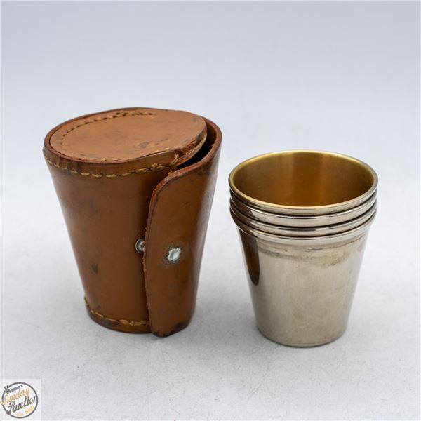 VINTAGE SET OF 4 ST. STEEL SHOT GLASSES IN GENUINE