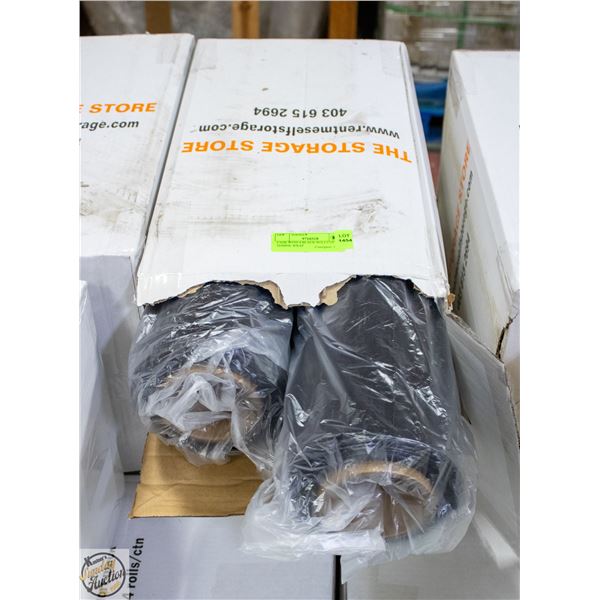 CASE WITH 4 BLACK ROLLS OF SHRINK WRAP