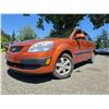 Image 1 : DUNCAN - 2009 KIA RIO ORANGE 240015 KMS - D481110