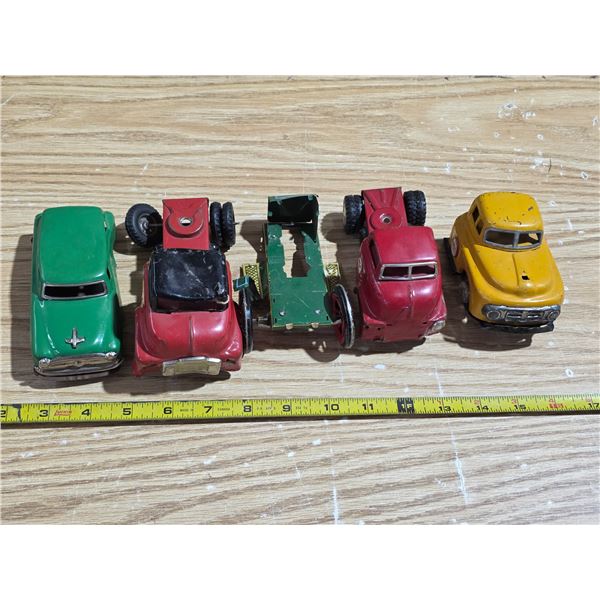 Vintage tin toy vehicles