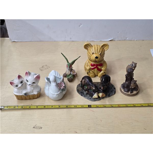 Various figures- swan, bird, beavers