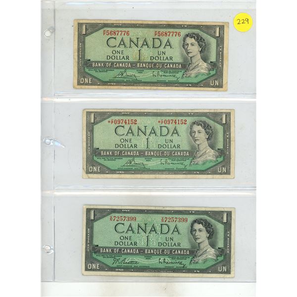 (3) 1954 Canada One Dollars.