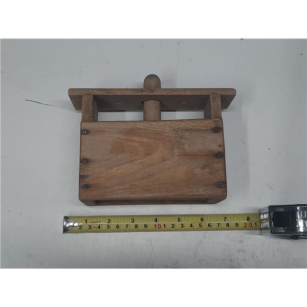 Vintage primitive wooden butter press.