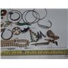 Image 4 : Large collection of assorted vintage costume jewelry, including brooches, necklaces, and bracelets.