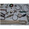Image 7 : Large collection of assorted vintage costume jewelry, including brooches, necklaces, and bracelets.