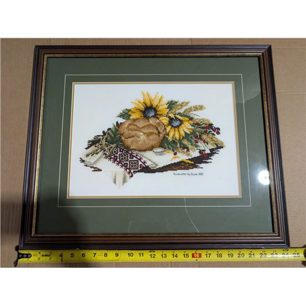 Hand cross stitched Ukrainian picture.