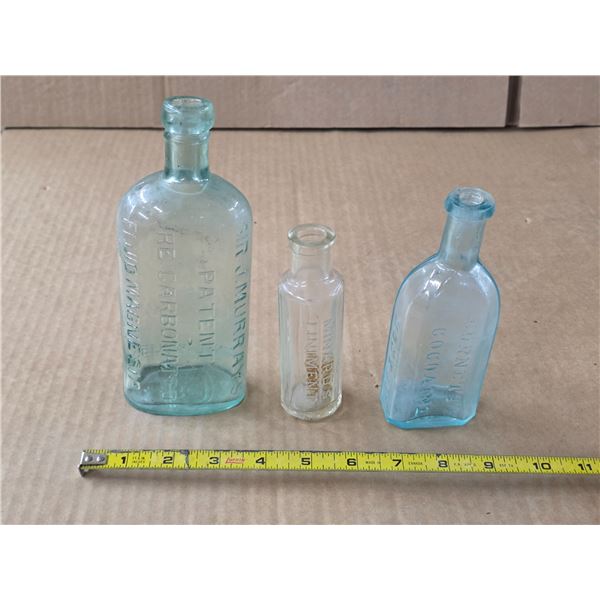 3 vintage medicine bottles- named