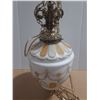 Image 5 : Vintage Hollywood Regency swag lamp features a milk glass globe adorned with gold embossed designs a